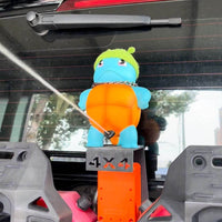 Figurina Spruzzatrice Auto — Un Getto D'Acqua Che Fa Sorridere 